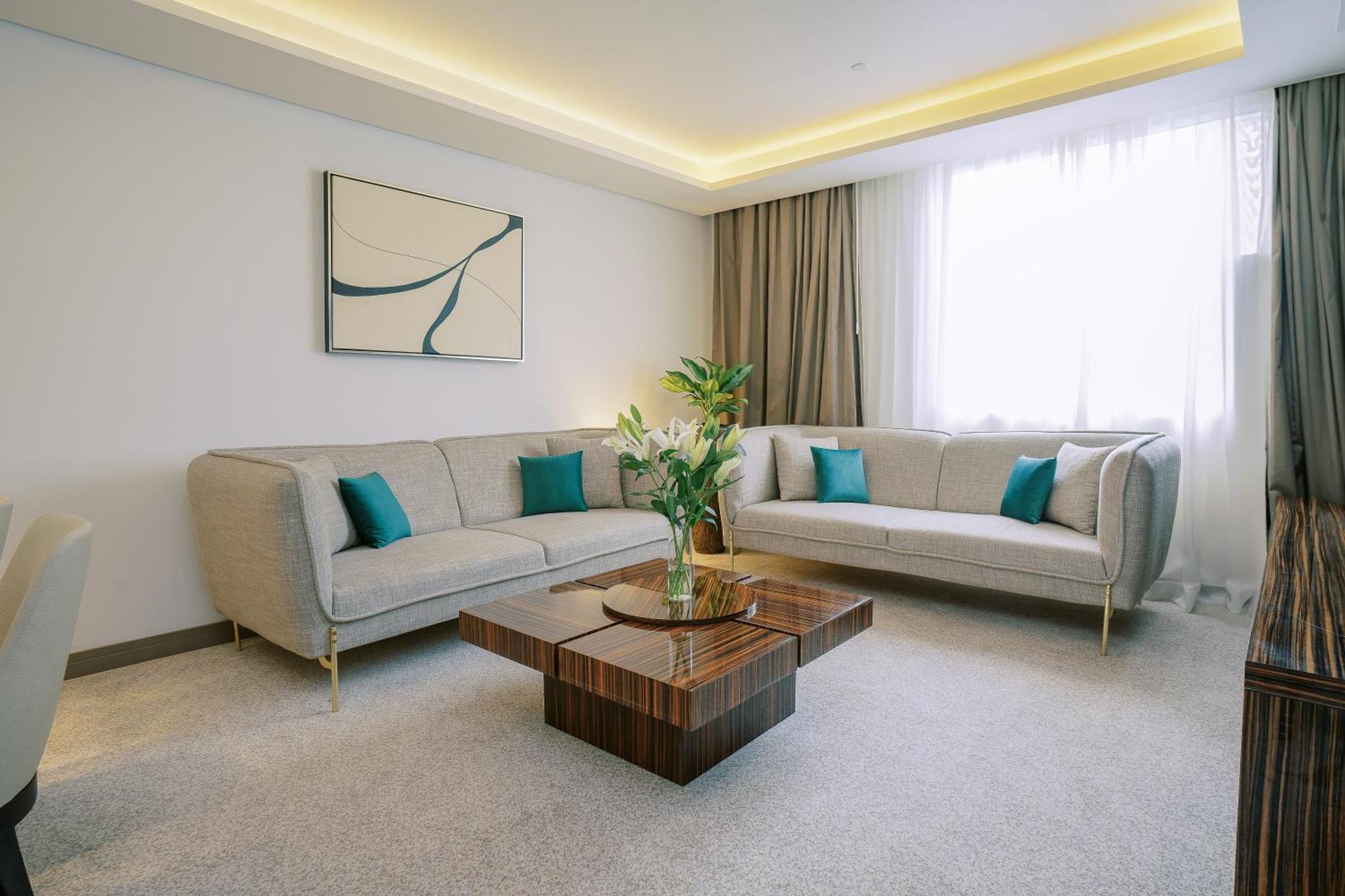 Khalidia Palace Hotel Dubai By Mourouj Gloria Eksteriør bilde A living room
