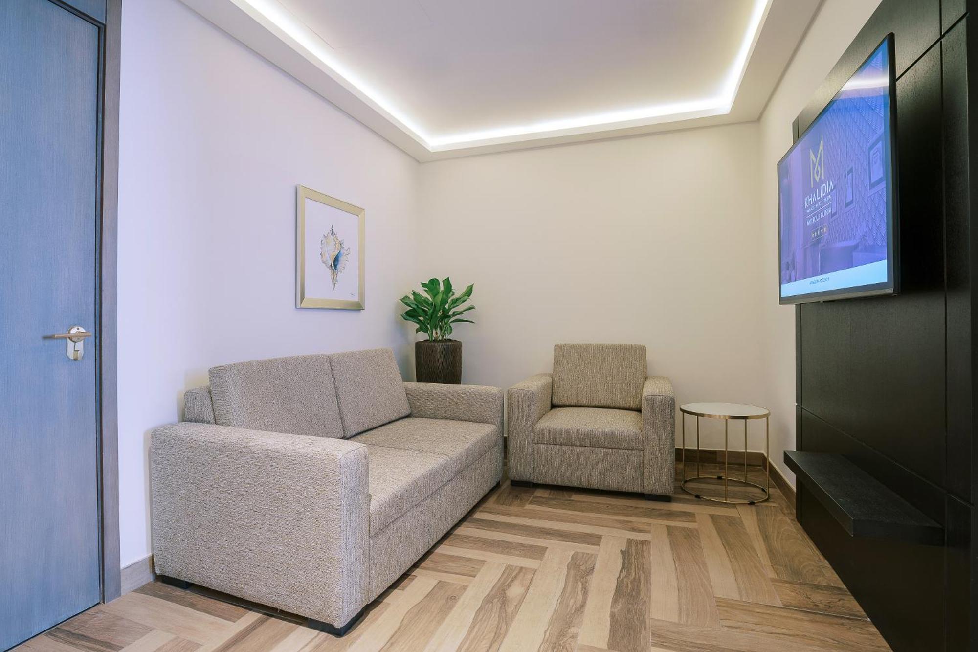 Khalidia Palace Hotel Dubai By Mourouj Gloria Eksteriør bilde A 3D rendering of a living room