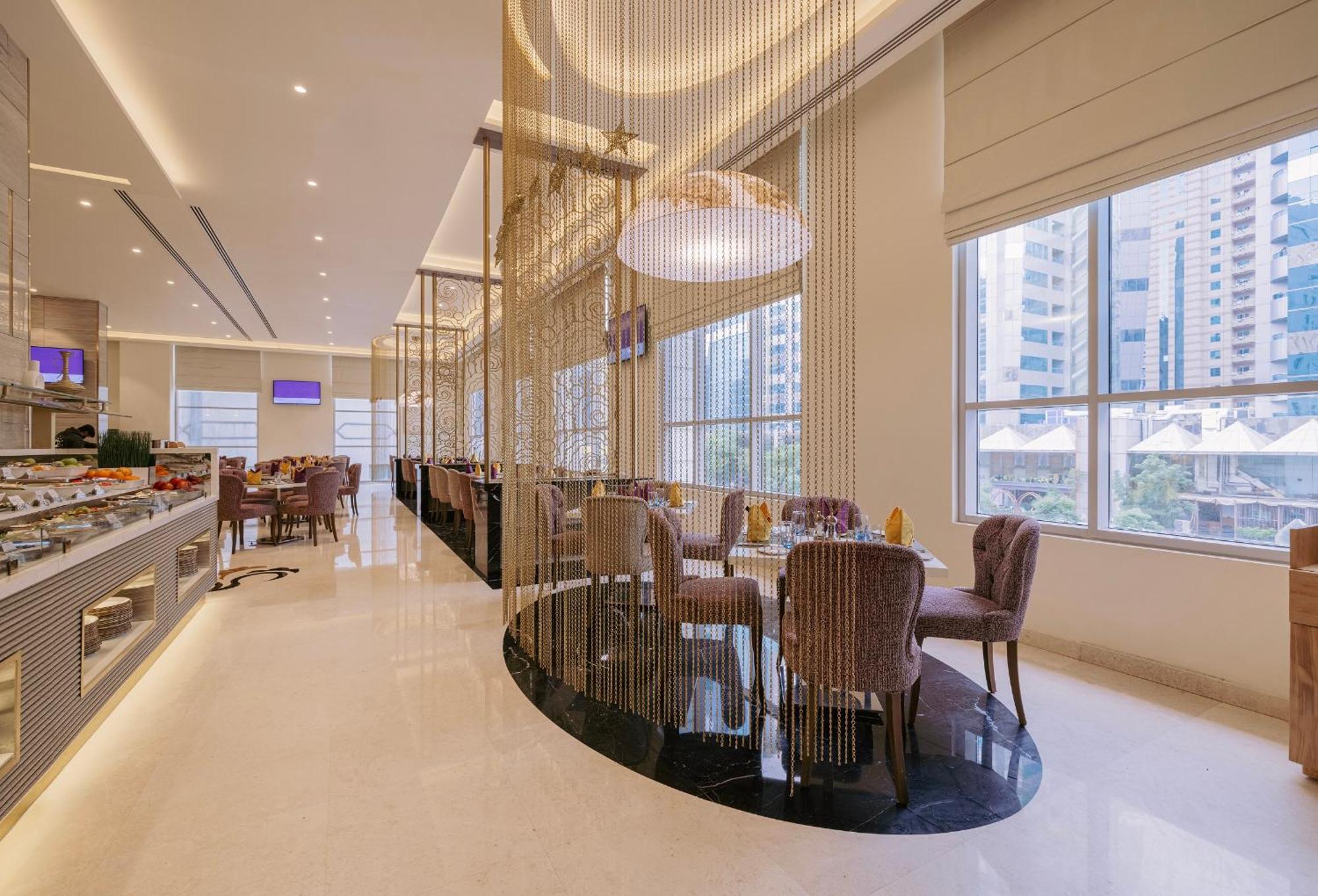 Khalidia Palace Hotel Dubai By Mourouj Gloria Eksteriør bilde The restaurant